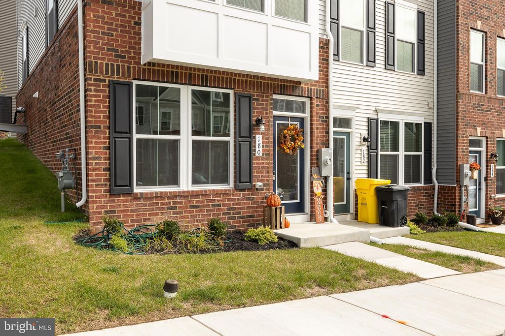 Photo of 180 Woodgate Circle #CLARENDON-3 STORY, PASADENA, MD 21122 (MLS # MDAA2128796)