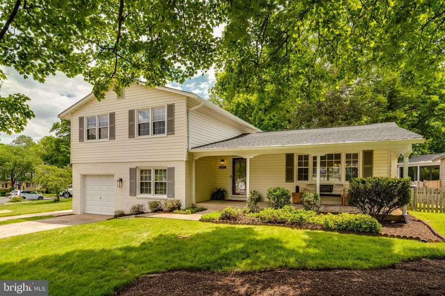 Welcome to this lovely 4-bedroom, 3 full bath, split-level Regent model situated on a large corner lot on a cul-de-sac in Kings Park West.  As soon as you walk in the door, you feel at home with an inviting living room that flows into the kitchen and dining room. The kitchen has been renovated to include 42" cabinets, granite countertops, and stainless steel appliances.  Gorgeous wood floors cover the main and upper levels, including the bedrooms.  The lower level features durable and stylish luxury vinyl plank in the family room and the 4th bedroom.  The basement provides a great space for another gathering space, home office, or gym.  The bathrooms (3 full!) have all been updated with modern touches. Enjoy the peaceful back yard on the large deck or sit back and relax on the front porch.  Either way, you'll enjoy all this home has to offer!  Kings Park West is a hidden  gem in Fairfax. Royal Lake, trails, tennis courts, playgrounds, baseball fields, soccer (with its own youth soccer league) fields, and 3 community pools (ready to join now with no waiting lists!) . Commuting is easy and convenient with metro express bus stops in the neighborhood and a 5 minute drive to the VRE.