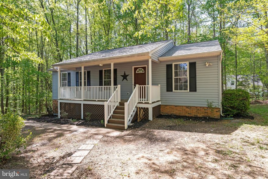 Welcome Home to this beautifully renovated  home nestled in the private woods of Lake Wilderness on a culdesac.  Amenities that will make you feel like you live in a resort with a clubhouse, pool, tennis courts, basketball courts, pavilion, snack bar, beach and volleyball area, campground, three lakes, a pond, two playgrounds, picnic and walking trails throughout. Brand new stainless steel appliances, beautiful center island, brand new floors, a ton of natural light throughout the home.  An oversized two car garage, new roof and freshly poured gravel driveway.