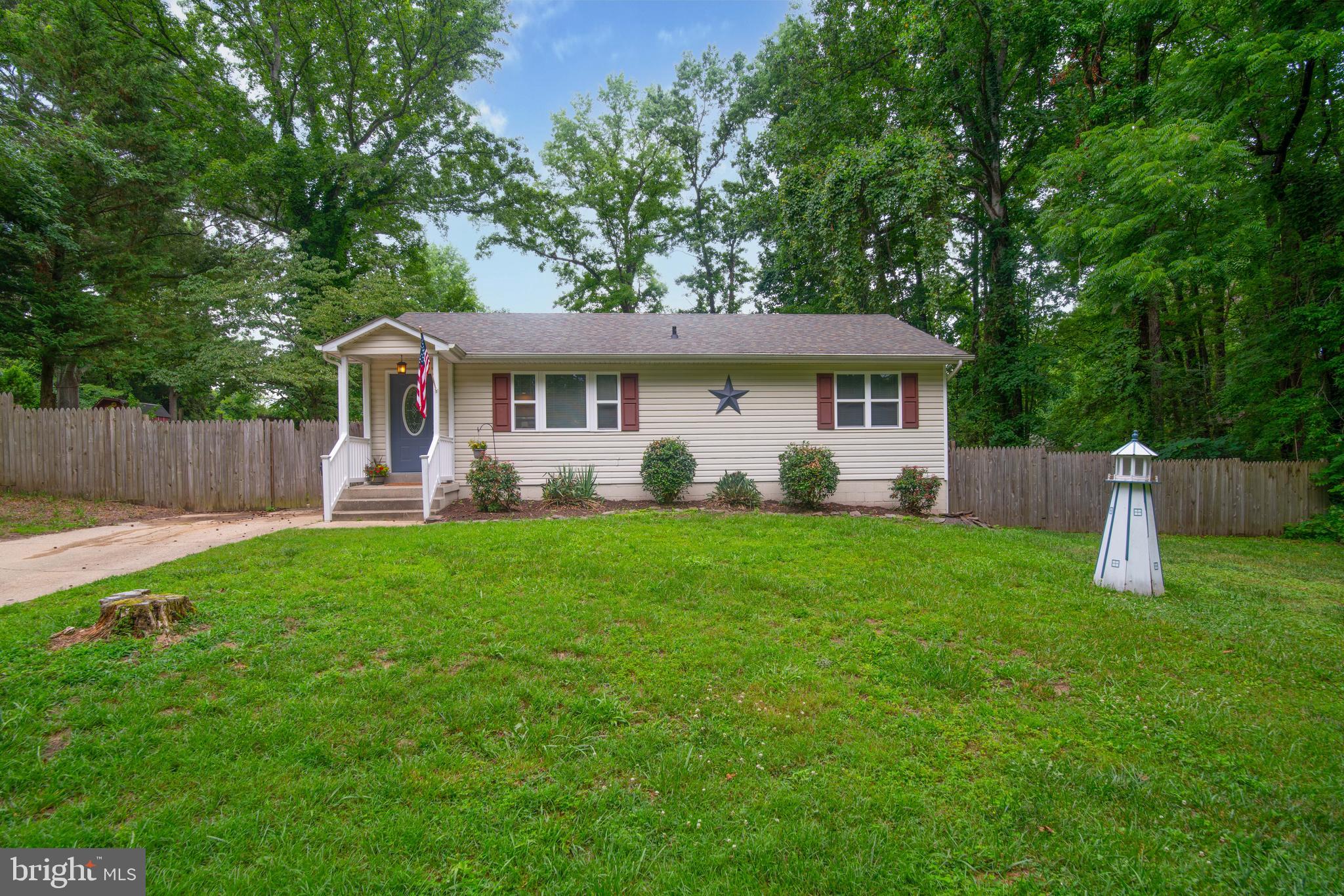 BACK ON THE MARKET buyers financing fell through Just in time for Summer!!! Private and cozy updated rambler nestled in a private beach community. Features brand new carpet in all bedrooms, fresh paint through out the house, an updated kitchen and full bath. Enjoy the summer heat on one of the five private community owned beaches. Hit the river on your boat with full access to three private community owned boat ramps. Enjoy peaceful relaxing evenings on your deck with a ton of privacy and fenced in yard. While all still benefiting from the short drive to Pax River and Washington DC.
