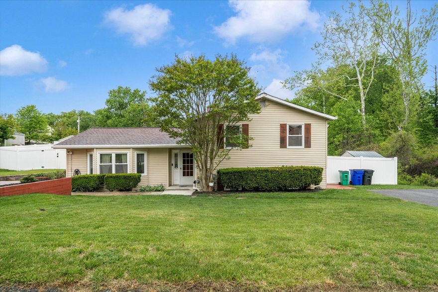 Tucked away on a quiet dead-end street, this spacious 4-bedroom, 3 full bath split-level home offers comfort, versatility, and a private retreat-like setting.  Beautiful hardwood floors enhance the main living areas, and the sun-filled living room features a charming bay window that welcomes natural light. 
Designed for year-round enjoyment, the enclosed sunroom showcases skylights and a cozy gas fireplace - the perfect space to relax or entertain in any season.  Step outside to your own fenced backyard oasis featuring a heated in-ground salt water pool and spa, all set within a private setting ideal for gatherings or peaceful evenings at home.
Additional highlights include efficient gas heat with heat pump backup, generous paved parking areas on both sides of the home, ChargePoint EVSE Level 2 charging station and three storage sheds providing ample space for tools, hobbies or seasonal items.
With solid features, great space, and endless potential to personalize, this home is ready for its next chapter.