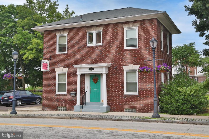 Highly coveted CORNER property at the intersection of MAIN STREET and BROAD STREET offers excellent visibility for your business in the heart of Downtown Souderton Borough.  Beautiful brick building with a convenient floor plan including 2 offices and a powder room on each floor.  The 2nd floor has a small kitchenette. There is also a built in bankers safe on the first floor and a walk-out basement for convenient access to storage. Other recent upgrades and amenities include: parking in adjacent parking lot, outdoor green space, hardwood floors, new replacement windows in 2019, new heat pump for heat and central A/C installed in 2020, new electric panel 2020, new overhead LED Lights in 2022, new water heater 2020 and new French drain in 2021. Come bring your business and become a part of the growth and thriving revitalization of Souderton Borough. This main thoroughfare is the place to be. Many permitted uses including attorney, CPA, financial planner, insurance, therapist, medical, dental, professional office, engineering, architecture, small scale retail, tailor, barber, beauty salon, cafe or small eatery with green space outside for seating and many more. See attached C3 Commercial Downtown Core District Zoning document for more information. Schedule your appointment today!