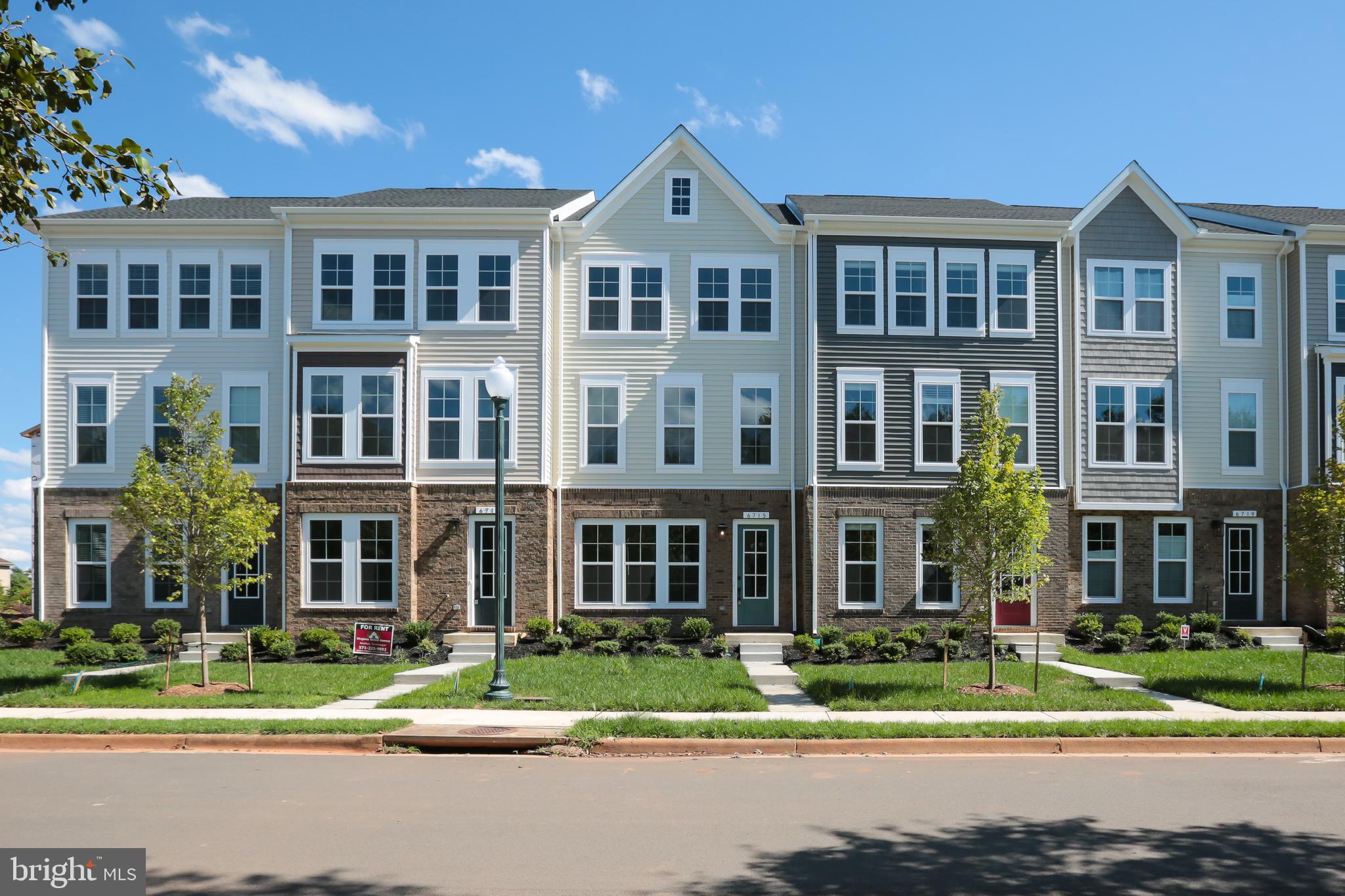 **Immediately Available** As brand new! Just 3 years young. Gorgeous luxury townhome Built by Van Metre in Robinson Village. Upgrades galore! 3 bedroom, 2 full and 2 half bath with rear load 2 car garage. Easy walk to local shops and restaurants. Charming Downtown Haymarket. Easy access to commuter routes and I-66. Community features a club house, tot lot and pool.