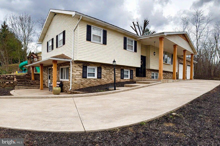 Welcome to this beautifully updated 5-bedroom, 2-full-bath home tucked away in the desirable Etters area. From the moment you step inside, you’ll feel the blend of modern style and everyday comfort that makes this home truly stand out. Lots of updates throughout, giving the home a fresh, move‑in‑ready vibe!  Granite Kitchen Counters, Newer Central Air/Heat, Newer Walk-in Tiled Shower in master bathroom, 2nd bathroom updated with newer tub/shower, both bathrooms new tile floors,  crown molding, whitewashed fireplace & added a fireplace mantle, recess lighting, new retaining wall, front and back porch stone, pillars added to front and side porch, wet bar in lower level, rooms repainted,  pellet stove, fence along driveway and much more!   Whether you’re hosting gatherings, working from home, or simply enjoying quiet evenings in, this home offers room to live, grow, and relax.