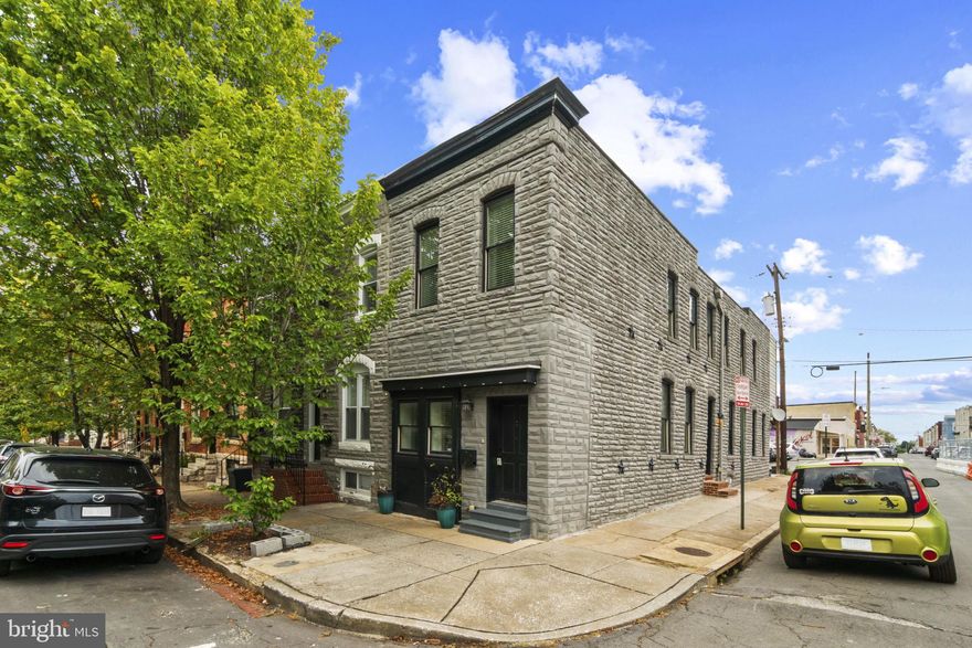 This updated corner rowhome with approximately 2,200 square feet of finished living space has a private parking pad and is close to Patterson Park, Johns Hopkins Hospital, and so much more. Centrally located to explore other areas of the city, and only a few miles from either I-95 or I-83. The main level has an inviting open floor plan with plenty of natural light, a large living room, separate dining area, and kitchen with an island and stainless appliances. The upper level has a primary suite which includes a private deck, walk-in closet, and an attached bath, second bedroom and second full bath. The finished lower level has 3 finished flex spaces (great for an office, gym, etc.), third full bath, unfinished storage area, and laundry room. This home is well maintained and will be leased unfurnished. The kitchen cabinets are freshly painted and there is new carpet in the bedrooms. Maximum of 4 occupants. No smoking/vaping. Trash/recycling service and Ezviz security cameras provided by the owner. All other utilities, including water, are the responsibility of the tenant. One-year minimum lease term. Online application with credit check. One month security deposit due at lease signing. Renter insurance required. Available Now!