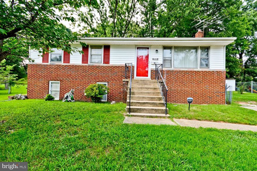 MULTIPLE OFFERS RECEIVED – SUBMISSION DEADLINE IS SET FOR WEDNESDAY, 7/26 @ 12 NOON.  PLEASE SUBMIT YOUR HIGHEST AND BEST OFFER!   WELCOME To This Move-In Ready Rambler Located In Lanham, MD That Boast 5 Bedrooms, 2 Full Bathrooms And A Fully-Finished Basement!  MAIN-LEVEL Features A Large Picture Window In The Living/Dining Rooms That Allows Plenty Of Sunlight * Hardwood Flooring Throughout * 3 Bedrooms * 1 Full Bath With Porcelain Tile Flooring And A Beautiful Tile and Trim Surrounding The Tub * Eat-In Kitchen With Modern Light Fixture, Stainless Steel Appliances, Designer Granite Countertop With Backsplash, and Plenty of Cabinet/Storage Space ** The Kitchen Door Leads To Your Private Driveway AND A Few Steps To The Rear Deck That’s Overlooking A Large Fenced Backyard…Perfect For Hosting Your Family And Friends Gatherings *** LOWER-LEVEL Has Its Own Entrance/Exit And Features Ceramic Flooring Throughout * Kitchenette * 2 Bedrooms * 1 Full Bath With Designer Tile and Tub Trim * Living/Dining Room Combo * Laundry Room * Closet/Storage Space ** This Home Is PERFECT FOR INCOME PRODUCING AND/OR AN IN-LAW SUITE *** UPDATES Include Newer Paint Throughout, (3) New Storm Doors, New Front Door, New Kitchen Door With Internal Blinds Between the Glass, Microwave and Kitchen Window (Still In New Boxes), Several Newer Windows, New Exterior Lights, New Motion Detector Lights, Front Railings, And Much More *** Convenient Access to Bus Line, Metrorail, DMV Beltway (495 & 95), Schools, Churches, Grocery Stores, Shopping Centers, Eateries, Restaurants and Entertainment *** NO HOA *** SOLD AS-IS *** Don’t Delay, Schedule Your Tour Today!