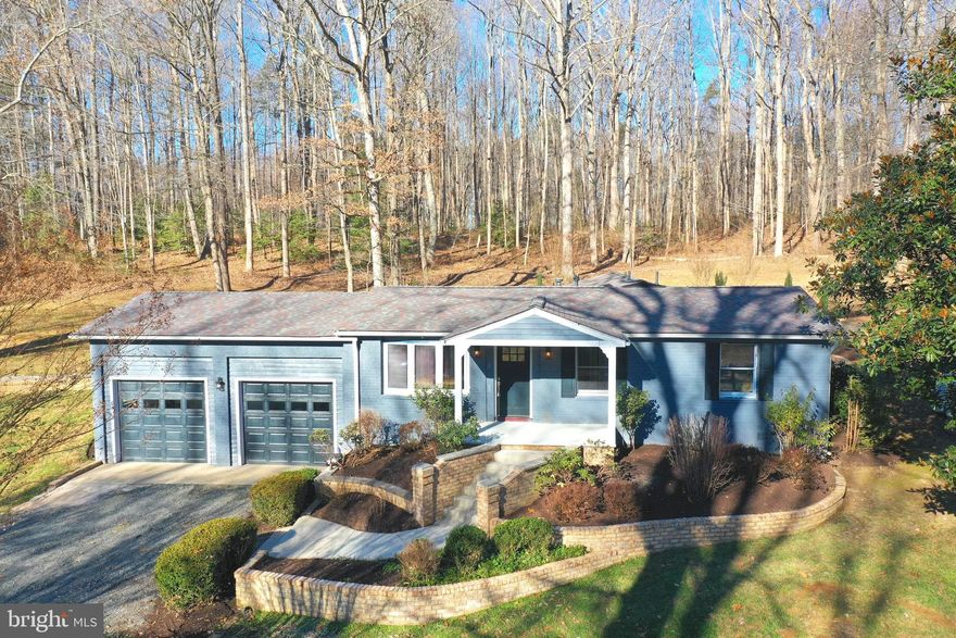 Welcome  to serenity!  Your dream home is situated on 5.5 wooded acres, in the private and quiet town of Hume, VA.  Tucked away from the hustle, yet just about 12 miles to Rte 66.  This stunning renovation brings an old country charmer up to todays modern design with an expanded and open floor place. Three spacious bedrooms all on one level.   Stunning gourmet kitchen complete with new stainless steel appliances, upgraded countertops, and plenty of cabinet and storage space.   Gleaming wood floors.  New modern fixtures and moldings throughout, as well as recessed lighting.  That's just the inside.  To live on this 5.5 acre property is to enjoy the outdoors.  There are two fenced paddocks for horses, and the property is zoned residential-agricultural, welcoming cattle and chicken.  There is also a large chicken coop to raise your own chickens, plus a garden for vegetables.  The exterior modifications include retaining walls which make the yard look neat and make landscaping easy to maintain, a paver patio complete with pergola, as well as a sidewalk which connects the detached three bay garage to the main house.  Come see this beauty and allow time to slow down, to appreciate the location and its peaceful surroundings! Piedmont Broadband recently installed a brand new router and potential buyer can test the speed before purchasing.