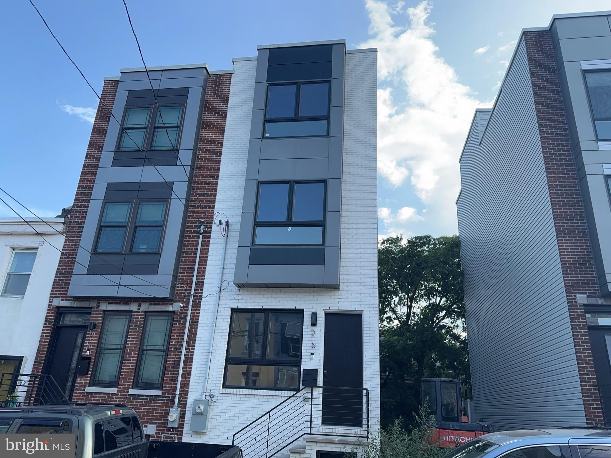 Welcome to this brand new contemporary home offering 4 bedrooms and 3 full bathrooms in one of Philadelphia’s most sought-after neighborhoods.
Step inside to discover a spacious open-concept layout featuring hardwood floors, recessed lighting, and a modern steel stair railing. The chef’s kitchen is equipped with soft-close cabinetry, quartz countertops, custom backsplash, and a full stainless steel appliance package. From the kitchen, walk out to your private backyard—perfect for outdoor dining or gardening.
The second floor presents two generously sized bedrooms with great natural light, along with a full custom bathroom. The third floor is dedicated to the luxurious primary suite, complete with a large walk-in closet and a spa-inspired bathroom with dual vanities and designer finishes.
A fully finished basement adds additional living space, ideal as a fourth bedroom, home office, or gym. Enjoy the convenience of upper-level laundry, energy-efficient HVAC, and contemporary finishes throughout.
Finally, head upstairs to the expansive private rooftop deck with stunning city views, perfect for entertaining or relaxing.
This home combines style, functionality, and location—don’t miss the opportunity to make it yours!