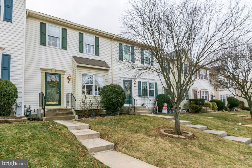 BEAUTIFUL PERRY HALL TOWN HOME BOASTS GLEAMING HARDWD FLRS, 10FT+ CEILINGS, BUILT-INS & GREAT OPEN LAYOUT! INCREDIBLE LIVING RM SPACE W FLR TO CEILING BUILT-IN BOOKCASES & ELEGANT CROWN MOLDING. LARGE COUNTRY KITCHEN W ISLAND, NEW SS MICROWAVE & STOVE. CLUB RM W HALF BATH, BUILT-IN BOOKCASES & CABINETS, SURROUND SOUND & FLAT SCREEN TV THAT STAYS!  DECK, FENCED YARD & SHED. AC- 6YRS OLD & NEW DRYER