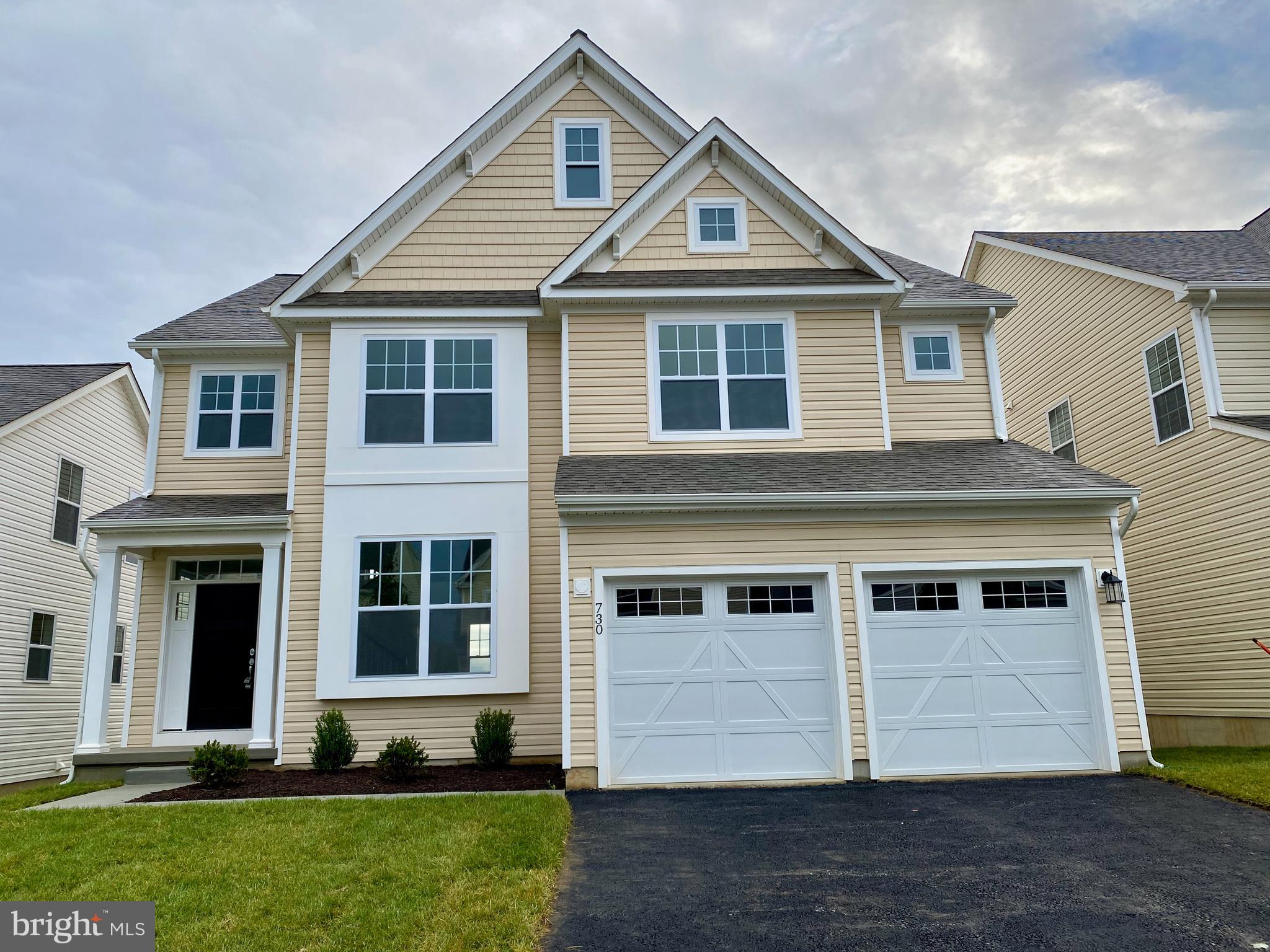 Welcome to the wonderful  East facing Mulberry model in East Village community! This is a brand new home and never occupied. The spacious floor plan of the single family home offers entry into the foyer from a charming front porch. The foyer is open to the dining room that flows into the beautifully open two level extended family room, breakfast area, and stunning kitchen. 
Upgrades: Sun room, extended family room, Wooden flooring throughout first level,  Wooden oak stairs,  Gourmet kitchen , granite counter tops, Upgraded kitchen cabinets (soft close) and upgraded appliances.
A powder room, pantry, mud room, and access to the two car garage are also on the main level. 
Upstairs you will find a stunning master suite with walk-in closet, tray ceiling, free standing tub and private full bath with dual sinks, three additional bedrooms, laundry area, and a full hall bath. 
East Village in located in the award winning Downingtown School District. This popular community offers resort style amenities such as a community pool, clubhouse with gathering rooms and a fitness center, sidewalks, walking trails and a playground!