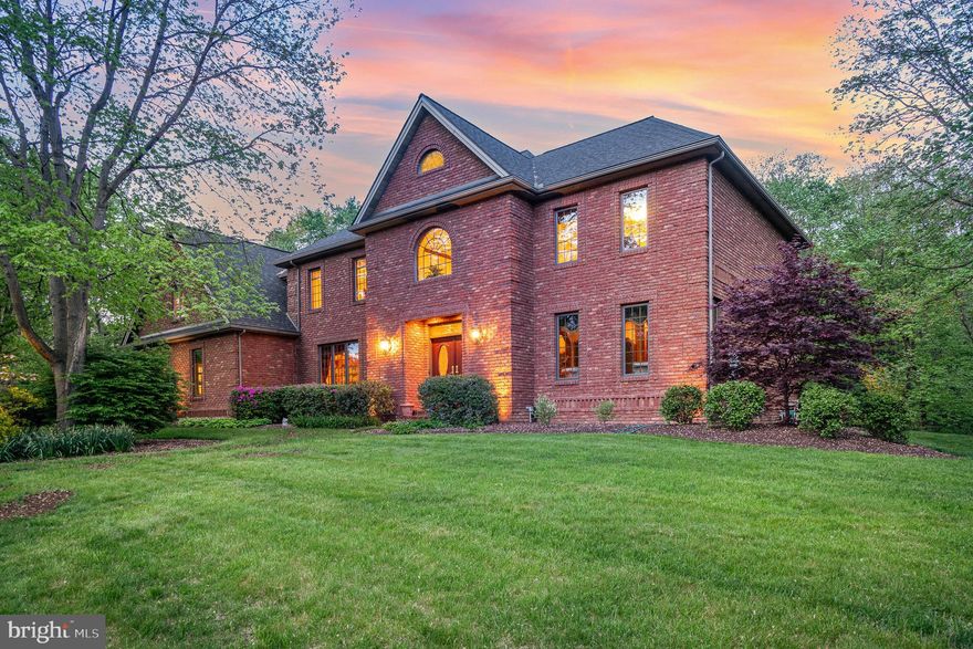 Welcome to this architectural masterpiece, nestled in the esteemed Pinehurst community within the top-rated Cumberland Valley School District. This all-brick masonry home boasts over 6500 sqft of elegantly designed living space, set on a nearly 1-acre private lot with a picturesque, tree-lined backyard featuring a serene meandering stream—perfect for nature lovers.
The grandeur begins with a hardscaped walkway framed by mature landscaping leading to impressive double front doors. Inside, the home opens to a breathtaking two-story entrance with a grand turned staircase, setting the tone for the rest of the property. The inviting kitchen is a chef’s dream, complete with stainless appliances, a butler's pantry, a breakfast bar, and an eat-in area that opens onto a covered rear deck. A formal dining room with tray ceilings and exquisite molding adds a touch of elegance to every meal.
This expansive home offers five bedrooms and five baths, including a versatile first-floor bedroom or office space, and a stately great room with a wood-burning fireplace and built-in features. The upper level is a private retreat unto itself, featuring a sprawling primary suite with a cozy gas fireplace, a separate vaulted office space, and an ensuite bath with luxurious amenities including dual vanities, a whirlpool tub, and a walk-in shower.
Entertainment is effortless in the fully equipped lower level, which includes a bar and pub area with beverage refrigerators, a kegerator, built-in wine storage, and a separate game room with a wet bar and full bath.
Additional features include detailed moldings and millwork throughout, a convenient first-floor laundry room, a heated oversized three-car garage with a workshop area, landscape lighting, a front lawn irrigation system, security system, a central vacuum system, and so much more.
This meticulously maintained one-owner home is more than just a residence—it’s a sanctuary where every detail has been crafted for comfort and style. Discover the perfect blend of privacy, luxury, and convenience in this exquisite Pinehurst estate.