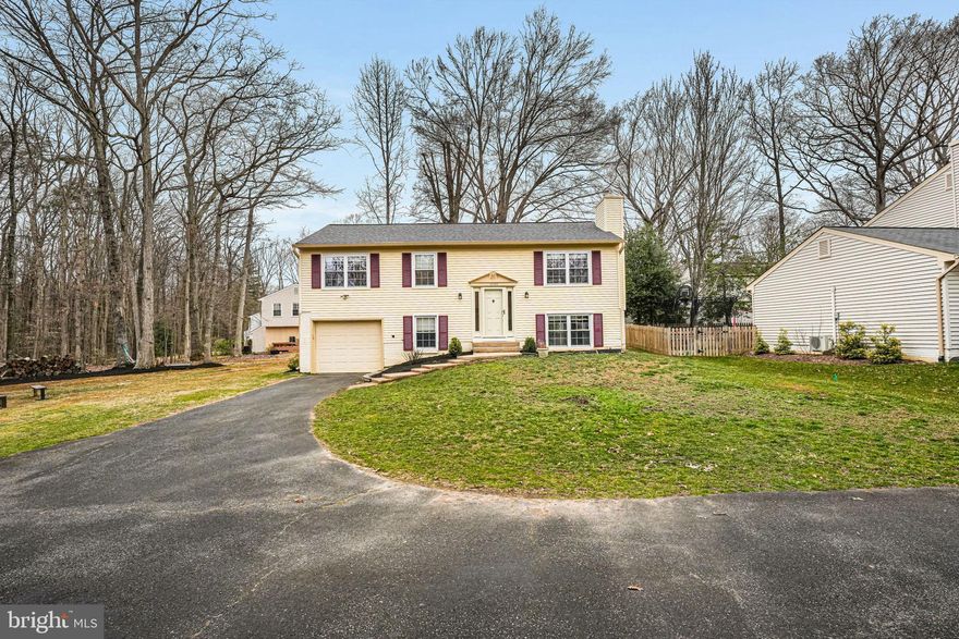 Welcome to your dream home! This charming residence welcomes you with an updated kitchen featuring sleek stainless-steel appliances and a stunning island illuminated by elegant pendant lights. Recessed lighting in the upstairs hallway adds a touch of sophistication and warmth. The main level has three bedrooms, each equipped with modern sliding-door closets, along with two luxurious bathrooms featuring anti-fog mirrors that blend style and functionality. The lower level features a fourth bedroom and a full bathroom, complete with a stylish anti-fog mirror that combines elegance and practicality.   Set on a sprawling 14,181 sq ft lot (0.3255 acres), with a garage and ample parking for 3-4 cars. This property provides a generous yard, perfect for entertaining and hosting delightful barbecues with family and friends. The Burke Centre Station for the Virginia Railway Express (VRE) is only 6 minutes away. Enjoy your own spacious abode in Burke Centre. The peaceful walking/biking trails, trees, and all out relaxation awaits. Welcome home!