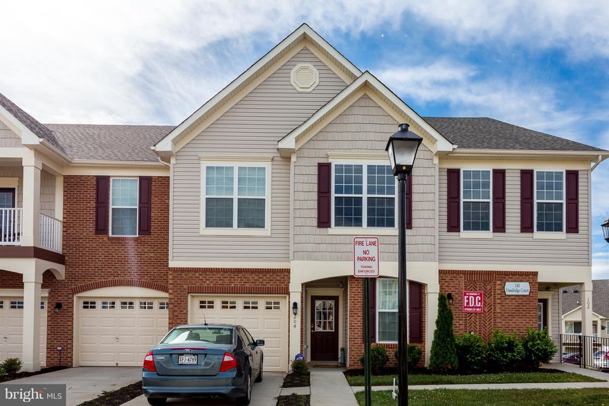 LESS THAN 1YR OLD,  2ND LEVEL CONDO W/ 1 CAR ATTACHED GARAGE. OPEN FLOOR PLAN W/ GRANITE KITCHEN, STAINLESS APPLIANCES, TREX & VINYL DECK, GREAT RM, DR, AND KITCHEN DARK HARDWOOD. HUGE MASTER BDRM WALKIN CLOSET AND MASTER BATH W/Master BATH WITH UPGRADE TILED SHOWER. LAUNDRY RM WITH FULL SIZE, LESS THAN 1 YEAR OLD WASHER AND DRYER.  GREAT MAINTENANCE FREE LIVING CLOSE TO I95, QUANTICO, & SHOPPING!