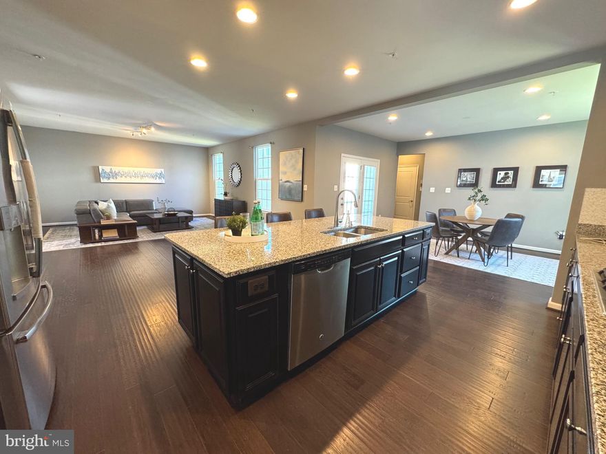 *** NEW PRICE *** $45,000 dollars REDUCED ***  SELL this house before I do ***Lawncare is included in HOA fee. Sunny and spacious brick front house , huge  great room  and chef-inspired kitchen with huge island make your home perfect for entertaining guests. Light filled spacious Living room, separate Dining room with Butlers pantry pass to the upgraded kitchen which features elegant cabinets, granite countertops, stainless steel appliances, stylish ceramic tile backsplash, a large walk-in pantry.  The main living level also has a home office . Oversized 2 Car Garage with 240 volt EV charger, TESLA  Battery power wall for continuous power. Monthly electric bill $6.32cents per mo. Upstairs you’ll find a luxurious primary suite complete with large bedroom with tray ceiling, spa-like bath with oversized shower and separate soaking tub, and two walk-in closets. The second floor also has a secondary bedroom with private bath, two additional secondary bedrooms with additional full bath, a sizeable laundry room, and a walk-in linen closet for added storage space. The expansive finished lower level offers enough space for Billiard room, Movie room, play room and  rec room that is the perfect flexible space, and an additional full bath.