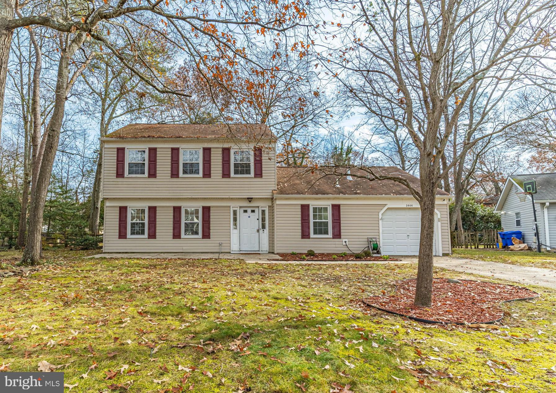 Step into modern luxury with this updated Colonial featuring a one-car garage. The open floor plan seamlessly connects the updated kitchen, boasting quartz countertops, stainless steel appliances, and an island with pendant lights, to the spacious living room with a custom stone accent wall. The dining room exudes elegance with a decorative chandelier, chair rail, and crown molding. Recessed lighting throughout the main level enhances the contemporary ambiance.
The main level is further enhanced by a fully updated half bath, family room, and a versatile bonus room in the back, perfect for a theater, home office, or gym. All new LVP flooring graces the main level, complemented by a brand new HVAC system. New dryer and ceramic tile flooring are in the mudroom with a mosaic accent wall.
The upper level is a haven of comfort, featuring three bedrooms with new carpet and LVP flooring, and two full baths.
The owner's suite is a sanctuary with a fully updated bathroom showcasing porcelain tile surrounds, an updated vanity, fixtures, and flooring. The second bathroom has been updated with LVP flooring a new vanity and light fixture. The fenced backyard, complete with a shed and fire pit, offers a private retreat. With new windows, fresh paint, and thoughtful updates throughout, this home, nestled in a cul-de-sac with access to a community pool and clubhouse, is a true gem.