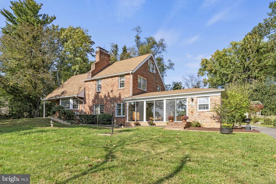 This all-brick, six-level split level is sited on just over a half acre in popular Williamsburg Village. Delight in this home’s spacious, sun-lit rooms, three wood-burning fireplaces, and attractive lot surrounded by mature trees. Lovingly maintained by its current owner, recent years’ work has included roof replacement, multiple new appliances, new hot water water heater and electrical panel. This property is move-in ready for a new owner to rock its retro look and feel; fantastic farmhouse kitchen, vintage green and pink bathrooms, and exposed brick and wood beam ceilings. Love modern and new? Bring your imagination and great taste - this space is ready for you!