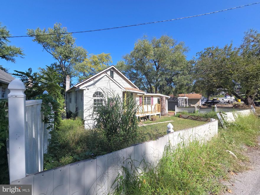 This is a Fannie Mae Reverse Mortgage Foreclosure.  This is a waterfront property ready for your vision.  There are two sheds and the basement has a separate entrance.  Great views of the water!  The interior has three living areas.  There is a den.  There are two bedrooms and two full baths.
