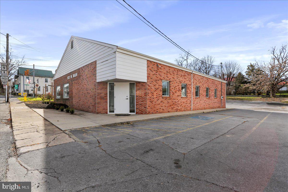 103 W Main Street offers approximately 3,113 (+/-) square feet of flexible office or retail space, perfect for a variety of businesses. With a recently refreshed, modern interior, this move-in-ready property is strategically located on a bustling main road with excellent traffic exposure. Don’t miss this exceptional opportunity to position your business in a prime, high-visibility location within a thriving community.
The subject property is located 4.7 miles from I-81, Exit 16W. Along Hedgesville Road, Route 9, there is a range of 13,496 - 13,588 vehicles per day (This data is provided by Esri, Esri and Kalibrate Technologies 2024).
The roof was replaced in September of 2017 and an entirely new HVAC system was installed in May of 2023. The kitchen/break room improvements (hood/three bay sink/grease trap) were installed in September of 2021.