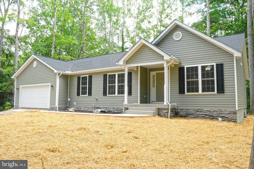 You'll love the open floor plan and fine finishes in this new construction rambler! Featuring a chef's kitchen, split floor plan, and cozy corner fireplace, you've found your dream home! Relaxing with family and friends in the interior open spaces or outside on the screened porch or deck will create great memories of lake living! A private, gated, secured community, Lake of the Woods offers anything and everything you could possibly want. Home to two lakes (the 550 acre main lake and a 35 acre "fishing lake"), a golf course, an equestrian center, a fire and rescue department, and a church all within the gates, Lake of the Woods simply has it all. Whether your passion is boating, waterskiing, kayaking, golfing, horseback riding, tennis, pickle ball, or simply taking in the breathtaking views from the clubhouse while enjoying a fabulous meal, from your own deck or yard, or from one of the beaches, you will be wowed! Perhaps you'd like a game of bridge or volunteering your time and talents...Lake of the Woods offers more than 60 clubs and/or organizations from which you may choose to become involved. Located in Orange County, we are fortunate to enjoy low real estate taxes. Coupled with home prices ranging from $150,000+ to over $2,000,000, Lake of the Woods is the perfect community for both full-time residents, as well as weekenders. But don't take my word for it, please come see for yourself! I will gladly give you a tour of Lake of the Woods by boat and by car so that you may experience why I love Lake of the Woods!