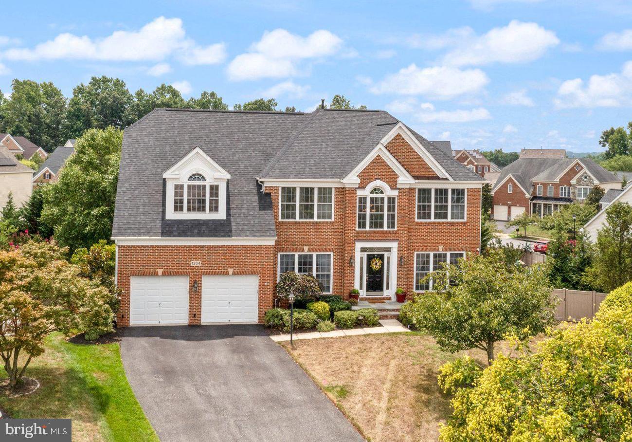 Open house this Sunday from 1 to 3pm! August 11th! Chapel Grove The Chelsea II Model! Welcome to this beautiful four bedroom, four full bath, & one half bath home, offering an exquisite blend of comfort and elegance located on a cul-de-sac! The Main level has hardwood floors throughout the formal dining room, spacious living room, the office/study, the inviting family room, the gourmet kitchen (with newer appliances as of 2022) and the rear solarium/sunroom. The laundry room is off the kitchen in the mudroom area off of the entrance from the garage. You can get to the upper bedroom level, either by the front staircase or from the staircase off of the kitchen. The Primary suite offers a sitting room with two walk in closets leading to the luxurious primary bathroom with dual vanities, shower, separate soaking tub & a private water closet. 3 other bedrooms are on the upper level, one of which has it's own bathroom, the other two bedrooms share the hall bathroom. The lower level features a full bathroom with a room that can be used for guests, a full recreational area that features a bar with granite counter tops, a beverage refrigerator, kegerator, & microwave, perfect for entertaining! This walk out basement leads to a stunning patio to enjoy & relax on! The patio leads to the fully fenced back yard and adjoining deck, ideal for outdoor gatherings! Additional features include, underground sprinkler system, exterior, evening lighting, a Generac full house generator, New roof installed in 2021, new water heater as of 2021, new HVAC system installed in 2019. The patio under the deck was installed in 2023, Thompson Creek Front door and back door installed in 2021! Chapel Grove amenities include an outdoor pool, playground and trails. Minutes to Fort Meade, the MARC train, shopping, restaurants & more! Don't miss this opportunity to own this wonderfully maintained home that combines modern amenities with timeless charm! Schedule a tour today!!