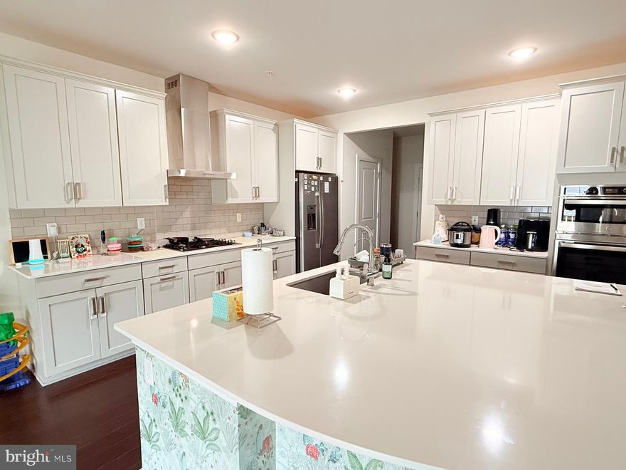 Townhome constructed in 2021 that still feels like new! This carriage-style residence offers three bedrooms, two-and-a-half bathrooms, a finished basement adding approximately 700 square feet of extra living space, and a two-car garage. The community provides convenient access to the Chester Valley Trail and East Whiteland Park, perfect for walking and biking enthusiasts.  

Upon entering through the front door, a welcoming foyer leads to the main living area and a conveniently located half bathroom. The kitchen serves as the heart of the home, featuring a large quartz island, stainless steel appliances, soft-close cabinetry, a built-in oven and microwave, and a spacious walk-in pantry. The open layout flows into a generous gathering space that includes areas for dining and relaxing. The living room features a gas fireplace and sliding glass doors leading to a Trex deck—ideal for outdoor dining or enjoying the breeze.  

Upstairs, the open loft offers flexible use as a lounge or home office. The primary suite occupies much of the second floor, complete with two walk-in closets, a separate sitting area, and a luxurious bathroom featuring double sinks, a walk-in shower, and a private water closet. Two additional bedrooms each include their own walk-in closets and share a full bathroom. A laundry room is also conveniently located on this level.  

The finished basement offers approximately 700 additional square feet of usable space, perfect for a recreation room, gym, home office, or media area while maintaining abundant storage. Throughout the home, recessed lighting, ceiling fans, and modern smart-home upgrades like Ring security, keyless entry, and a Ruckus gateway ensure comfort and connectivity. Schedule a visit to experience this impressive home before it’s no longer available!  


Make your appointment to see this stunner before it’s gone!