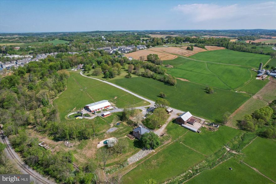 Over 22 acres of your own slice of heaven! Convenient and yet secluded farm at the end of Slingluff Road. 96' by 60' dairy barn with nine paddocks, including electric fencing and heated waterers. Barns, sheds and milking facilities are in addition to the charming home overlooking a meandering stream and acres of pastureland. There are countless possibilities for agricultural, livestock and/or private uses. Milking equipment is not included in the sale of the property. Beautiful home includes Sub-zero refrigerator in the custom kitchen, radiant floor heat in some areas of the house and eight working fireplaces!
