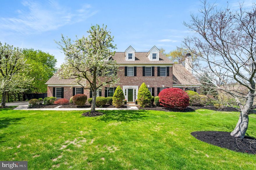 Welcome to 3940 Fountain Circle, one of 33 sublime homes in the Estates at Brookside, in the heart of the rolling hills of Bucks County. From the street, the home appears both imposing and welcoming.  Inside, it gets even better.
The spacious first floor has hardwood floors and fresh, neutral paint throughout. From the entry foyer there is a dining room, with beautiful inlaid ribbon hardwood and a formal living/sitting  room. The eat-in kitchen features granite countertops, an island with a gas cooktop, refinished wide-plank wood floors, stainless steel Jenn Air appliances, including an under-counter wine chiller/refrigerator. The kitchen and family room offer some local Bucks County vibes featuring Moravian tile trims. Off of the kitchen is a large deck with a retractable awning and a great view of the inviting, heated, salt water pool and neighboring farms. Adjacent to the kitchen is a large family space with a gas fireplace and a separate flex space for an office, playroom or whatever your family might need.  The spacious Laundry/Mudroom area is on the first level with doors leading to the three-car garage and the deck. 
On the second floor, the comfortable main bedroom offers two walk-in closets and a very large En Suite bathroom with a soaking tub and walk-in shower. In addition, there is a large hall bathroom and three more bedrooms. Off of one of the bedrooms is a finished bonus space, which can be used as a workout area (with a TV mount) or an entertainment room, which includes a movie projector that comes with the house. 
The basement, with a lower-level entrance, offers a very large living space and small kitchenette area provides many possibilities for entertaining, gaming, and more. There is also another large area, which has been used as a workout room (with TV mount), could also be used as a workshop or as additional storage space. The lower level is also where the fifth bedroom is located and another full bath. With direct egress to the backyard, the basement could potentially become an in-law or au-pair living area. Exiting this space through the French doors brings you to a very special outdoor space, with a tin roof for rain or shine relaxation and entertainment. TV mount and power are already in place. Within the pool area there is a fabulous stone fire pit, low-maintenance landscaping and great pool furniture which will stay with the home. The two+-acre backyard has two large storage sheds and a couple of small raised veg/flower beds.
Conveniently located just outside Doylestown Borough, in the Central Bucks School District. All the major conveniences, including Septa regional rail are just minutes away, along with major routes leading to New Jersey, Philadelphia, and New York City. This home literally has it all!  Don't wait to schedule your private tour.