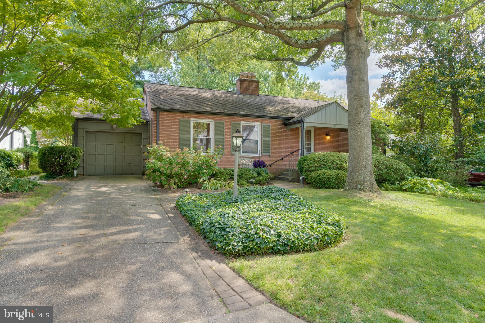 Welcome to this delightful mid-century residence on a serene tree-lined street in the popular Town of Somerset. Overlooking a lushly landscaped private yard, this lovely home incorporates the exuberant and whimsical styles of the 1950's while providing comfortable living areas and great entertaining spaces. There is a sun-drenched living room with a corner fireplace, a spacious dining room with double doors to the sunroom, a table space kitchen, and a sunroom with bucolic views and access to the garage and yard. Imagine cookouts and barbecues on the patio, morning coffee and casual dinners in the sunroom, and soccer games on the large lawn. Completing the main level are three generously sized bedrooms, two baths, fixed stairs to the attic, and a garage. The expansive lower level features a paneled family room with fireplace and built-in shelving that was the wonderful setting for neighborhood plays, musical productions, birthday parties, and magic shows. In addition, there is a private office or potential fourth bedroom, full bath, playroom that was the scene for many a ping pong tournament, a large utility and laundry room, and an exterior entrance.
The home's superb location is close to all amenities that the Town of Somerset has to offer - a community swimming pool, tennis courts, batting cage and basketball hoops. The award-winning Somerset Elementary School is nearby. The Fourth of July picnic, parties and dinners at the Pool, and trick or treating on Halloween are popular Town traditions. Within walking distance are the jogging and biking trails of the Capital Crescent Trail, Norwood Park, Metro, Friendship Heights, and the shopping and restaurant scene in downtown Bethesda.