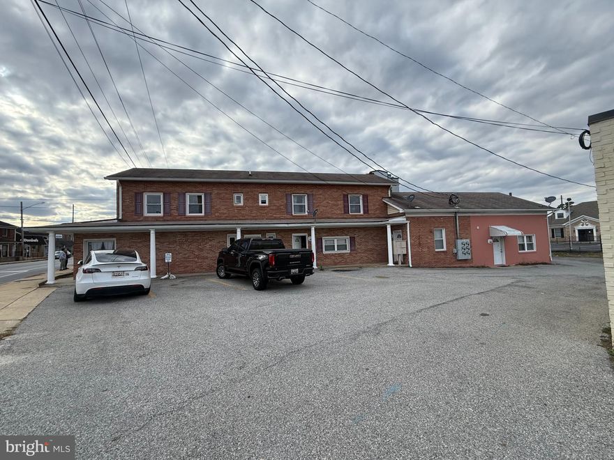 Welcome to The Charles Seven — a rare, turn-key mixed-use property offering both stable income and long-term growth potential. Perfectly positioned along the vibrant Charles Street corridor, this property combines modern residential living with street-level commercial visibility, making it ideal for investors, owner-occupants, or entrepreneurs seeking a flexible asset in a thriving Southern Maryland community.

This well-maintained building features seven total units — five residential apartments and two commercial spaces — designed for function, comfort, and convenience. Each apartment offers spacious layouts, updated kitchens, and in-unit amenities suited for today’s renters. The commercial units boast prime street frontage, high visibility, and steady traffic, perfect for boutique retail, office, or service-based tenants.