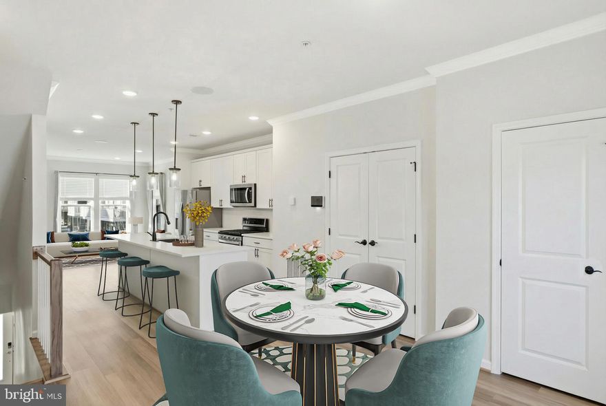 Welcome home to this like-new end-of-group townhome offering modern finishes, flexible living spaces, and incredible community amenities, all in a prime location within the neighborhood! This home is centrally positioned near the pavilion, clubhouse, dog park, and the beautiful pocket park right behind it, making everyday living convenient and enjoyable. As you enter, you’re greeted by LVP flooring and a versatile main-level bedroom, ideal as a guest room, office, or cozy den. This level also includes a full bathroom with a tub/shower combo and access to the garage. Head upstairs to the second level, where you’ll find an impressive open floorplan with high ceilings that create a bright, airy, and seamless flow, perfect for entertaining or relaxing. Host gatherings in the spacious living room, enjoy meals in the dining area, and cook with ease in the beautifully upgraded kitchen featuring tons of cabinet storage, ample prep space, a tile backsplash, quartz countertops, stainless steel appliances, and an island with pendant lighting and bar seating. Crown molding and recessed lighting add a polished, modern touch. A powder room on this level adds convenience for guests. The third floor features two generous bedroom suites. The primary suite boasts abundant natural light, spacious closets, and a private ensuite with dual vanities and a beautifully tiled walk-in shower. The secondary suite includes a walk-in closet and a full bathroom with a tub/shower combo,  perfect for guests or additional family members. Step outside to the rear deck and take in views of the community grounds, an ideal space for summer BBQs or evening relaxation. Parking is effortless with a one-car garage and private driveway. This exceptional community offers a pavilion, fire pit, picnic benches, pocket parks, a tot lot, and a pool, making it easy to enjoy the outdoors. Plus, you’ll love the unbeatable convenience to major highways (32, 295, 95) and nearby shopping, dining, and everyday essentials. With modern living, a highly desirable location, and community amenities at your fingertips, this home truly has it all. Schedule your showing today!