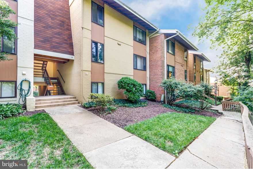 NOW FOR SALE !!!! LARGE CONDO 2 bedroom suites,  2 full bathrooms  and downstairs ½ bath.  2 fully loaded and modern levels. The large eat-in kitchen has stainless steel appliances, stove with two ovens and above mounted Microwave oven.  Custom hardwood bamboo flooring in the kitchen.  Two private balconies, which are perfect for dining or lounging, offer beautiful views of the fall foliage.  The open and airy space features loads of natural light. Newly refinished parquet wood flooring throughout. Private dedicated covered assigned garage parking under unit.  Large private storage locker located next to garage. Only minutes away from major highways (83, 695). Close to Light Rail, Metro and  Penn Station.  Condo is surrounded by walkable shopping, restaurants, tennis courts, three pools and community club house all within the gated confines of the Village of Cross Keys.  The Village of Cross Keys features 24-hour ON-SITE SECURITY.