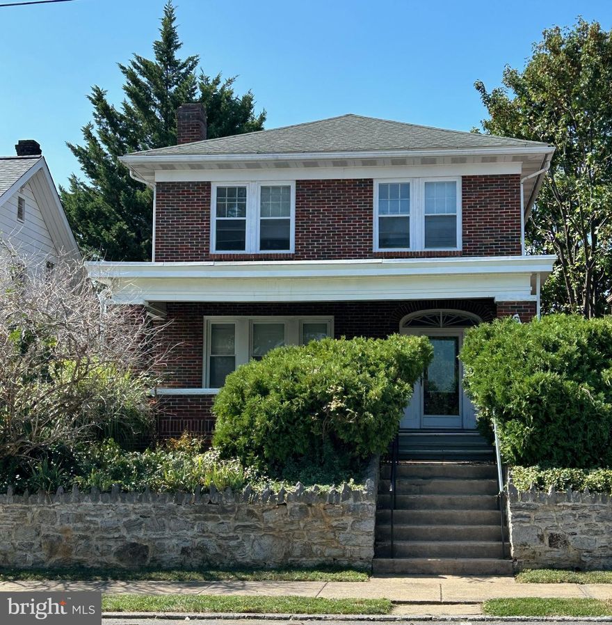 All brick home close to City Park and shopping areas.  Enjoy your morning coffee while sitting on the large front porch or in additional room located on the 2nd floor.   Warm up by fireplace on those cold nights.   The home has 3 bedrooms and 1 bathroom on the 2nd floor , as well as an extra room which can be used for a small office or sun room.   The large garage located at the back of the house provides off street parking for 2 vehicles.  The home has a newer water heater and furnace .  The home is an estate property and is in need of some TLC.  It is being SOLD AS IS.