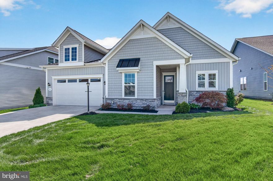 Featuring one of DRB’s largest homes built in the 55+ community-Amblebrook, 374 Lively Stream Way offers nearly 3,100 square feet of beautifully designed living space with an impressive list of upgrades. Backing to open space with no direct rear neighbors, this home provides added privacy and a peaceful setting.
Just off the foyer, you’ll find an office/den that offers flexibility for a home office, sitting room, or even space for a daybed. The open and inviting floor plan allows the kitchen, dining, and living areas to flow seamlessly together—perfect for entertaining and everyday living.
The gourmet kitchen showcases upgraded cabinetry, granite countertops, a gas oven, upgraded appliances, a large center island, and an oversized pantry providing exceptional storage. The spacious primary suite features a bump-out, generous walk-in closet, and additional storage room to keep everything organized and out of sight.
Wide luxury vinyl plank flooring adds both style and durability throughout the main living areas. At the rear of the home, the Four Seasons room offers the perfect place to relax year-round, complete with a corner gas fireplace and retractable awning.
Additional upgrades include premium window coverings and shutters, a top-of-the-line tankless water heater, and an irrigation system for easy lawn maintenance.
Beyond the home, Amblebrook offers an exceptional lifestyle with resort-style amenities including a clubhouse, art studio with bar and lounge, dog park, fitness center, game room, hot tub, party room, picnic areas, indoor and outdoor pools, shuffleboard, pickleball, and tennis courts.
This home truly delivers the perfect combination of space, upgrades, privacy, and community living.