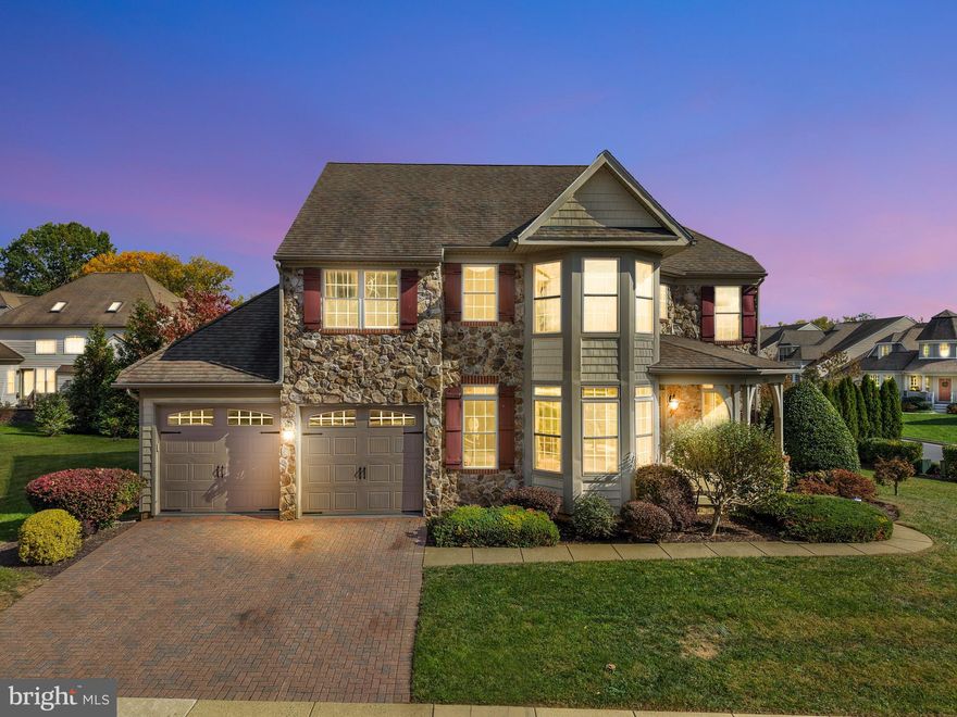 Stunning former model home on Mill Island in Worman’s Mill Village! This 4BR, 3.5BA home features a main-level primary suite plus a second primary upstairs, offering flexibility and comfort. The great room boasts cathedral ceilings, a striking stone fireplace, and gorgeous tigerwood hardwood floors throughout the entire first-floor living space. Enjoy cooking in the gourmet chef’s kitchen with granite counters, stainless appliances, and a sunlit breakfast nook, plus a formal dining room for entertaining. A main-level office/bonus room, spacious deck, and fully fenced yard add to the appeal. The full basement provides tons of storage and room to expand. Set on a corner lot, this home offers elegance and convenience in one of Frederick’s premier communities—close to Downtown Frederick, shops, restaurants, and easy commuter access to I-270, Route 15, and I-70.  Mortgage savings may be available for buyers of this listing.