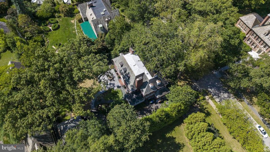 This beautifully updated 6 BR/4.5BA home in the heart of Guilford blends timeless architectural character with top-to-bottom modern updates. Perched on a hill across from Sherwood Gardens, it offers one of the most coveted addresses in Baltimore. 
Inside you’ll find a fully renovated gourmet kitchen with marble countertops, top of the line appliances, and a beautiful eat-in sunroom with custom built-in bench seating. A stylishly designed dining room sets the stage for entertaining, while the cozy, light-filled family room is perfect for everyday living. Rounding out the main level is a beautiful office that blends original built-in shelving with modern design.
Upstairs, spacious bedrooms and all fully updated bathrooms provide comfort and style. The primary suite includes a large bathroom with soaking tub, oversized shower, dual vanities, and a walk-in closet. The finished basement offers a built in bar and plenty of room for entertaining and fun. Every space in this home is truly move-in ready.
This home has been meticulously maintained, with updates that include new flooring and a bar in the basement (2022), new sewer line(2022), new roof (2023), and designer lighting installed throughout. Enjoy the convenience of being just a short walk to Johns Hopkins University, restaurants, and coffee shops. A rare opportunity in one of Baltimore’s most desirable neighborhoods!