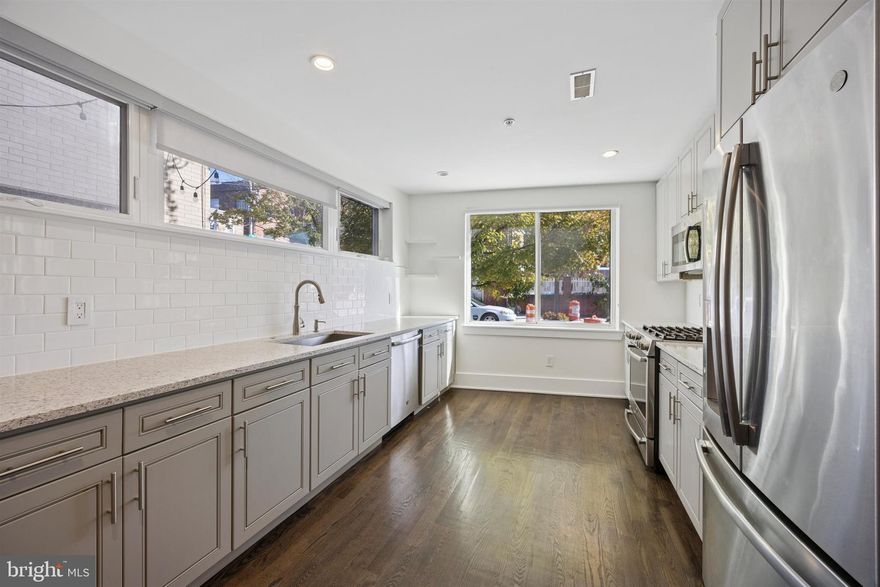 From the moment you arrive, you'll feel at home in this 2-bed, 2-bath condo. Walk into the common courtyard—look up to see the twinkling outdoor lights—and through your own private entrance. Upon entering, recessed lighting creates a light and airy ambiance with modern features and clean lines. Here, you'll find an intimate family area that's perfect for cozy nights in and movie nights. The straight-through style of the home allows for a small dining space before entering the open kitchen. There, cooking is a breeze thanks to stainless steel appliances, a gas oven/stove, and large sink that makes cleaning simple. Light grey cabinetry, white subway tile, and custom blinds throughout the home add a modern yet inviting style. The kitchen offers a pantry closet with custom built-ins and pull-out drawers.

Head downstairs to find the spacious bedrooms—both feature double door closets. High ceilings in these rooms also make them feel even larger. One bedroom features tray ceilings, as well. The bathrooms provide privacy for both bedrooms, one of which features a tub/shower while the other is a walk-in shower with marble-like tile backsplash. The new IKEA wardrobe is also included, if the buyer desires.

Located in Queen Village, street parking is decently accessible along the main streets, while permit parking is available on residential. Plenty of parks are nearby, as well, including Jefferson Square and the Shot Tower Recreation Center. Around the corner, find The Palm Tree Market, Philadelphia Java Company, For Pete's Sake, and Lucky's Last Chance. James Beard Award-nominated restaurant Royal Izakaya is also in the neighborhood—enjoy omakase, sushi, and traditional Japanese bites. For even more bites and shopping, South Street is only a 12-minute walk away. Broad Street and Spruce Street Harbor Park are also within a 10-minute drive. 

This home will go fast! Don't miss your chance to make it yours and schedule your tour today.