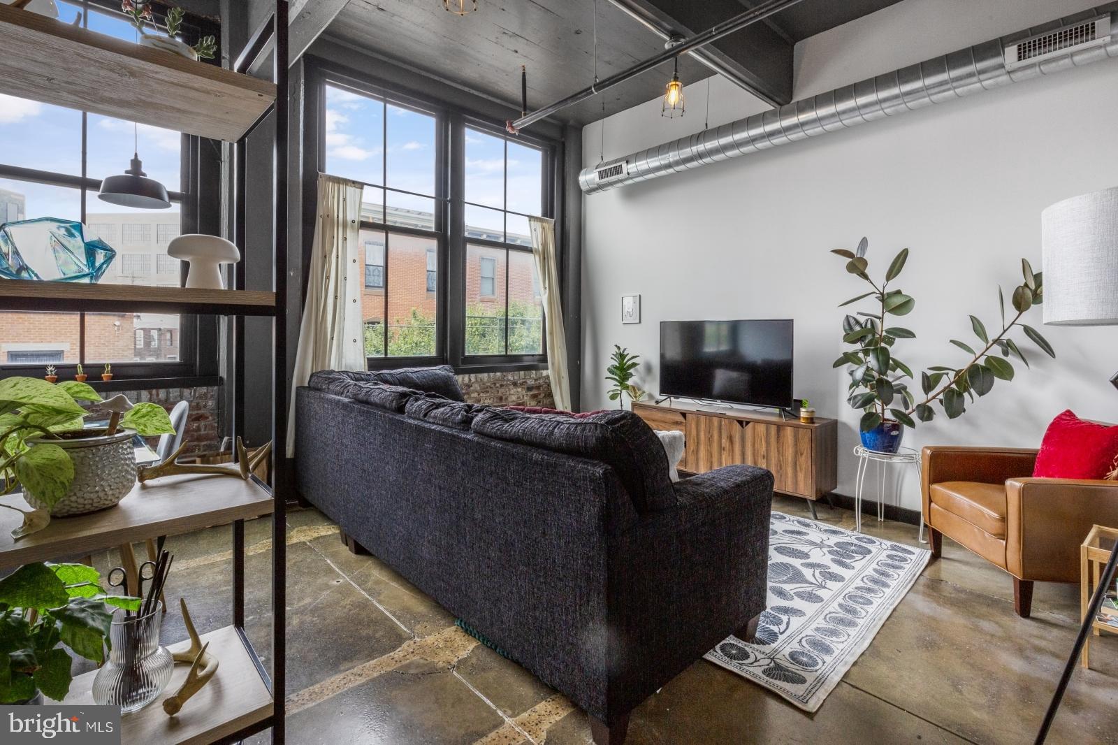 Available Mid-September:
REACH Lofts features stunning apartments within a historic charm that only a converted building can offer! Building amenities include an elevator, secure electronic entry, bike room, Amazon Hub, storage units, and more! Each unit offers a spacious, industrial vibe with high ceilings, polished concrete floors, exposed brick, and spiral ductwork. The modern kitchens are beautifully appointed with chic cabinetry, subway tile backsplashes, and stainless steel appliances. Enjoy the ease of in-unit laundry and bathrooms featuring sleek, contemporary fixtures. Central A/C ensures comfort all year long. Unit #203 is a gorgeous 2 bedroom, 1 bathroom second floor apartment. Step into a gorgeous space adorned with polished concrete floors, exposed brick, oversized windows, and high ceilings, providing an airy and open atmosphere. The exposed ductwork adds an industrial charm, complemented by an abundance of bright natural light that fills every corner. The kitchen is a minimalist's dream, featuring sleek cabinetry and a stylish subway tile backsplash. The bathroom is equally impressive, boasting a lively ambiance, a frameless glass shower, and a contemporary lighted vanity. Don’t miss out - schedule your showing today to claim this exceptional rental!
Lease Terms:
Generally, first month, last month, and one month security deposit due at, or prior to, lease signing. Other terms may be required by Landlord. $55 application fee per applicant. Pets are conditional on owner’s approval and may require an additional fee and/or monthly pet rent, if accepted. (Generally, $500/dog and $250/cat, and/or monthly pet rent). Tenants responsible for: electricity, cable/internet, monthly flat water fee ($45), and HVAC payment to 3rd party. Optional storage cages are available for rent: $25/month for small and $45/month for large. Landlord Requirements: Applicants to make 3x the monthly rent in verifiable net income, credit history to be considered (i.e. no active collections), no evictions within the past 4 years, and must have a verifiable rental history with on-time rental payments. Exceptions to this criteria may exist under the law and will be considered. Cosigners accepted.