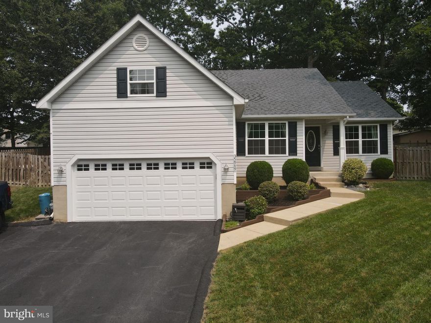 This beautifully updated 4-bedroom home boasts custom woodwork throughout, providing a touch of elegance. With 3 full bathrooms and a two-car garage, it offers convenience and space for your family's needs. Enjoy the perks of living close to a golf course, boat ramp, community pier, and beach, making it a paradise for outdoor enthusiasts! Don't miss the chance to call this gem your home!