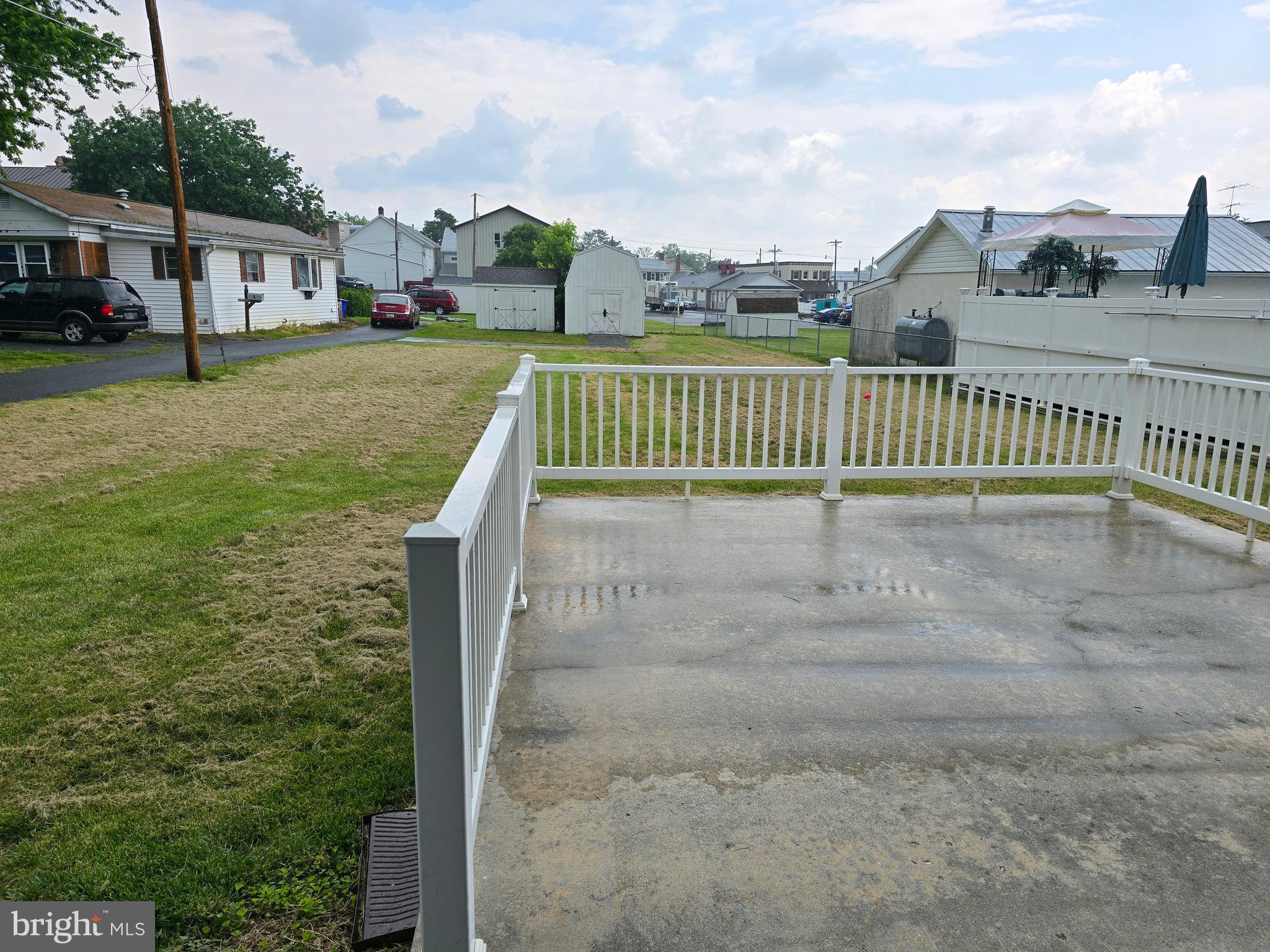 Currently being updated with fresh neutral paint throughout! Featuring brand-new toilets, bathroom sinks, updated lighting, and new LVT flooring in the kitchen, living room, and recreation room. All three bedrooms will have brand-new matching LVT installed.
This charming split-level home offers nearly 1,500 sq ft of comfortable living space, including 3 bedrooms and 2 full bathrooms. Located in town but tucked away from heavy traffic, it features an attached 2-car carport and a welcoming patio—perfect for outdoor entertaining. The kitchen boasts ample cabinet storage, and newer flooring is already in place on the main and lower levels.
Enjoy a covered front porch, generous parking space, and a nearly 1/3-acre level lot ideal for yard games and gatherings. The home is filled with natural light and offers abundant storage, including two large sheds on the property. Centralized HVAC system with backup baseboard heating ensures year-round comfort. Conveniently located near Hwy 15 and a local park—this one won’t last long!