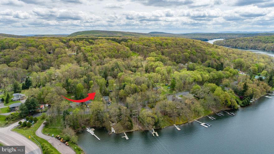 Here’s your chance to own a Dock slip at Deep Creek Lake! Located just off iconic Lake Shore Drive, this rare corner lot offers filtered views of the water and convenient access to your very own dock slip. Public sewer available. Level lot that’s tucked in a quiet pocket just minutes from dining, marinas, and the slopes at Wisp. Whether you're dreaming of a cozy second home, vacation rental, or just a place to put your boat - this property sets you up to enjoy the best that “Lake Life” has to offer… Opportunities like this are few and far between—call today for details!