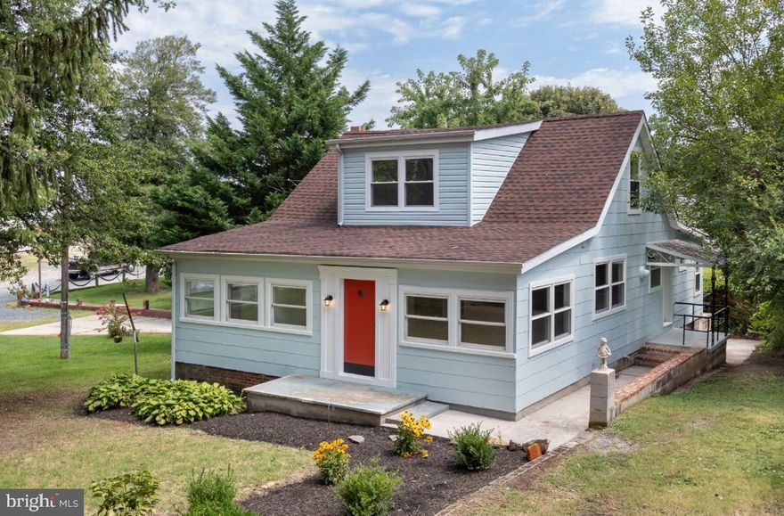 Welcome to this beautifully remodeled cottage in Essex, ideally located just one house off the water with sweeping views from many rooms. This home blends timeless cottage charm with the convenience of a complete, modern renovation. Every detail has been refreshed such as new flooring, paint, lighting, doors, and fixtures throughout, making this home truly turnkey.

The heart of the home is the brand-new kitchen, featuring quartz countertops, custom cabinetry, and stainless steel appliances. A small covered porch sits just off the kitchen, offering a private spot for morning coffee, potted plants, or extra storage.

The thoughtful floor plan includes a private office on the main level, perfect for working from home, as well as a spacious first-floor primary suite with a full en-suite bath. Upstairs, three additional bedrooms provide plenty of room for family, guests, or flexible living space. Large windows throughout fill the home with natural light and showcase water views from multiple vantage points.

Step outside and enjoy the lifestyle of living so close to the water, whether it’s catching a sunset, launching your boat from a nearby marina, or simply enjoying the coastal breeze. All of this comes with the convenience of nearby restaurants, shopping, and easy commuter access. If you’ve been searching for a move-in ready home that combines character, comfort, and water views, this Oak Avenue cottage is the perfect fit.