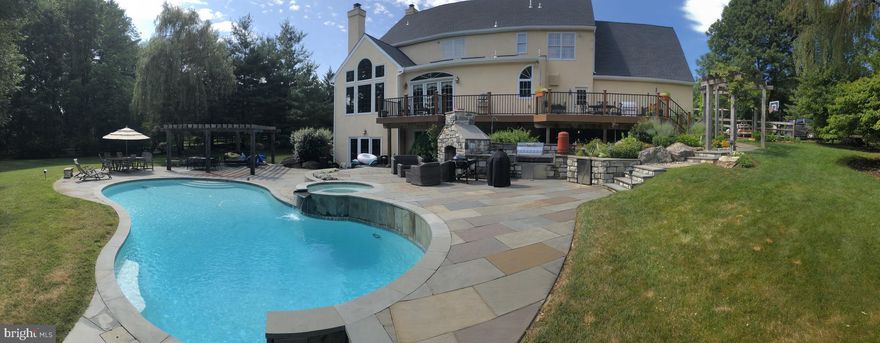 A rare opportunity to own this luxurious home in the highly desirable Turnbridge development in Malvern.  5300+ sq. ft. of stately elegance.  As you enter the two story foyer, you  are surrounded by sophistication and attention-to-detail.  Head upstairs to  the primary suite and indulge in your oversized tub.  Use the other 4 bedrooms for the kids, an upstairs office, or whatever you need an extra room for. There is plenty of space for all your needs.  Come back down via the secondary staircase.  A grand kitchen with a cooking enclave and a massive island, that is well suited for an informal meal or upscale entertainment, will keep everyone engaged as the chef does the cooking .  Step out of the kitchen through the sliding patio doors onto the full length deck that overlooks the backyard and gorgeous saltwater pool with attached hot tub.  After a swim, relax on the huge flagstone patio by the outdoor fireplace before you cook dinner on the outdoor built-in grill.  Off the patio, gain entrance to the 1000 sq. ft. basement which boasts a large great room, an additional kitchen, a workout room, and another full bathroom.  Your comfort throughout this spacious home is controlled by two HVACs with 3 zones of climate control.  This home comes with a premium 1 year home warranty to ensure peace-of-mind before and after the sale.  1450 Eaves Spring Drive in Malvern is a must see!