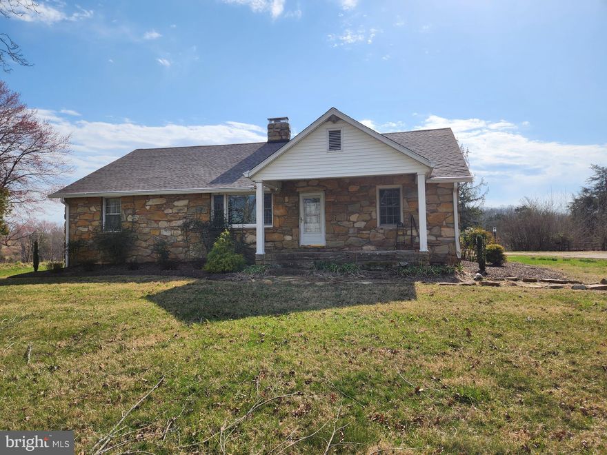 Location, Location, Location! 6.0 miles west of Warrenton,  across the road from Fauquier Springs Country Club, in the heart of hunt country.  This is a beautiful 12 acre lot with a fixer upper house.  House has beautiful stone exterior, recent heating system and roof but needs a rehab inside.  Electrical panel and all recepticles, water pressure tank, and hot water heater replaced in 2021.  Generac standby generator powered by 500 gallon propane tank.