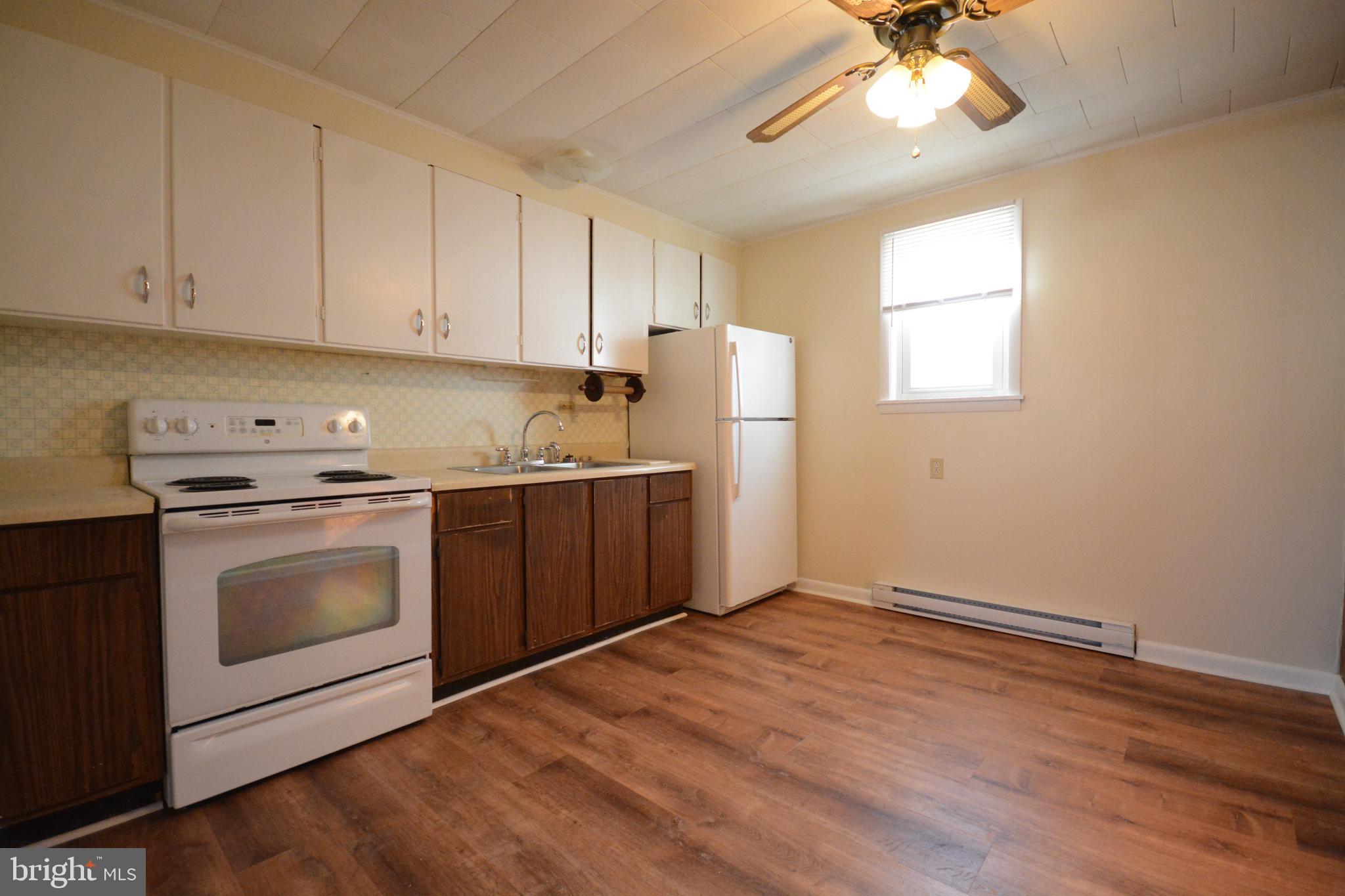 Spacious two bedroom, one full bathroom first level apartment in multi-tenant building.  Freshly painted, NEW flooring, and all NEW baseboard heaters throughout!  Kitchen includes stove/oven combo and full size fridge.  Quiet location in the quant town of Emmitsburg, located on the main street in town with walking access to the town and its amenities.  **Sorry, No Pets allowed! Unit does not have washer & dryer! (Please note: Unit will be professional cleaned)
Apply online to : middlepointproperties.com. Application fee is $40 per adult. Online payments or Checks/Money Orders made out to Middlepoint Property Management. Two recent pay stubs or Letter of Employment for new hires. Complete background checks are performed on each application to include employment, credit and criminal history. Nominal debt/income ratio should be 40% or less.