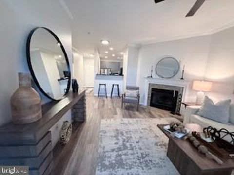 Photo of 8181 Carnegie Hall Court #301, VIENNA, VA 22180 (MLS # VAFX2314448)