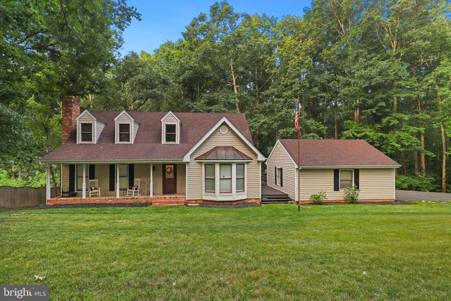 Welcome home to 12900 Verrey Court in the Lake Wilderness community. You will just fall in love with this Cape Cod with 2000+ finished square feet with a huge detached two car garage. Situated perfectly on this corner lot, you are surrounded by the peace and quiet of the trees and mature landscaping. Look at the new improvements that the homeowner has recently completed: Roof (2018), Kitchen appliances (2019), carpet in Primary Bedroom, stairs and upstairs foyer, upper level bathroom flooring, full Kitchen renovation (2020), HVAC and entire house siding (2021), and hot water heater (2022). The Kitchen is a chef's delight with these granite countertops, stainless steel appliances, farmhouse sink, huge island, and upgraded cabinetry. There are all new light fixtures, recessed lighting, and under cabinet lighting in here as well. The Dining Room is both elegant with it's trim work and spacious with views of the huge front yard. Step down to the cozy and comfortable Family Room with its exposed wood beams and wood-burning fireplace. Enjoy the main level Primary Bedroom Suite located at the back of the home with the attached Primary Bathroom and huge walk-in closet. Make your way upstairs to the two other bedrooms and an updated full bathroom. This nearly half acre lot provides privacy and room to enjoy the views. Lake Wilderness provides lake living, an outdoor pool, tennis and basketball courts, beach and volleyball areas, playground, campgrounds, snack bar, and so much more. Call for your tour today!