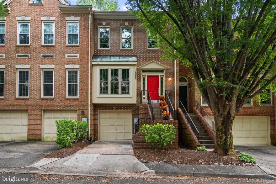 PRICE IMPROVEMENT!
SELLERS OFFERING $5,000 in Closing Cost Credit!

Welcome to this rarely available, brick 3-level garage townhome loaded with high end updates in the Churchill School District. Ideally situated at the end of a beautiful, secluded tree-lined cul-de-sac, this spacious home offers stylish living space, blending classic charm with modern upgrades.

The main level features a marble foyer, a striking entirely renovated eat-in kitchen with floor-to-ceiling windows, quartz countertops, custom cabinetry, new appliances, and modern tile flooring. Beautiful hardwood floors lead to the formal dining room with crown molding and custom millwork and arched columns that open to a living room with a cozy wood-burning fireplace with marble surround, and light-filled floor-to-ceiling windows. Glass French doors lead to a private fenced-in slate patio, perfect for outdoor entertaining. A newly renovated half bath completes this level.

Upstairs, hardwoods continue throughout three spacious bedrooms abundant with natural light, brightened by multiple skylights, including one in the hallway and another in the luxurious primary suite spa bathroom. The (2022) primary bath features a Porcelanosa double vanity with KRION Solid Surface sinks and countertop, freestanding Wyndham Collection soaking tub with center drain, walk-in rainfall shower with custom glass pebbled shower flooring and niche, custom lighting, and Grohe chrome fixtures throughout. The fully renovated upstairs hall bath (2022) includes updated tilework, vanity, niche, lighting, and sliding glass shower doors. One of the secondary bedrooms includes custom California Closet bookshelves, ideal for a home office or reading retreat. Ample storage is available via pull-down attic access.

The finished lower level offers a generous recreation room with custom built-in shelving, new ceramic flooring, a second wood-burning fireplace, a stylish half bath renovated in 2025 with Porcelanosa vanity, mirror and sink, new flooring, and a spacious laundry/utility room with new flooring, utility sink, and 2023 energy-efficient washer and dryer. This level also provides direct access to the one-car garage and driveway.

Recent upgrades include a new cedar shake roof (2021), new and refinished hardwood floors (2023), recessed lighting throughout (2025), HVAC (2016, serviced 2025), water heater (2017), energy-efficient windows and appliances (2022–2023), copper piping for main and internal waterlines, and ceramic tile flooring in the basement (2023). The fenced rear patio was re-leveled and refinished in 2025.

Don’t miss this rare opportunity to own a beautifully updated, move-in-ready townhome in one of Potomac’s most desirable locations. A peaceful retreat surrounded by nature—yet just minutes to world-class shopping, dining, and transit—7822 Oracle Place is ready to welcome you home.