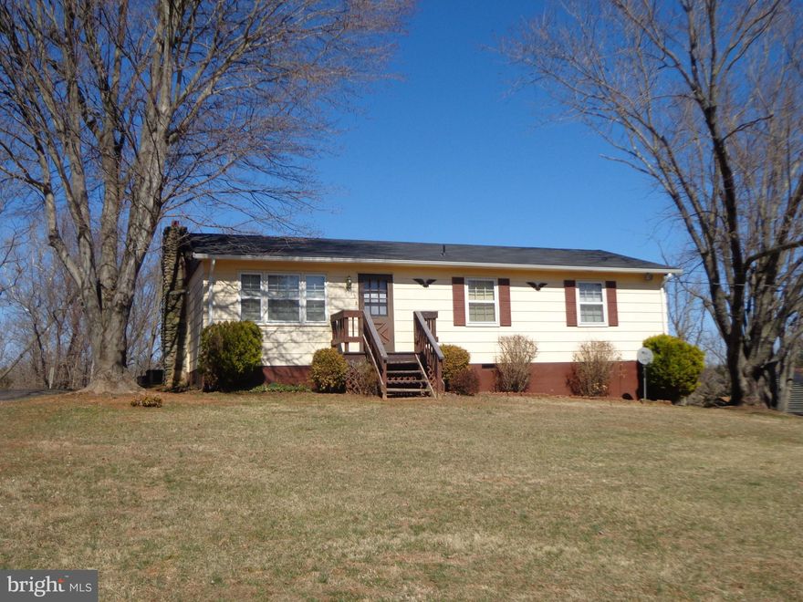 Cozy Rambler features 3 bedrooms, 1 bath on almost an acre lot. This home also includes a deck with great views and an outside shed with electricity.  New roof and gutters in 2013.  Home sold "AS IS" condition.