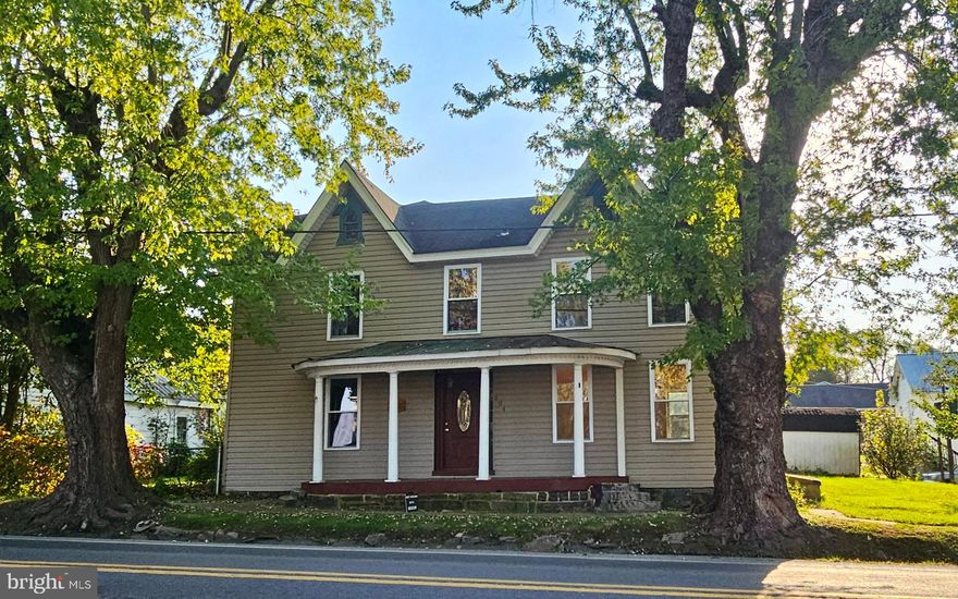 On Main Street in the Historic Town of Hedgesville, sits this beautiful, stately home built in 1832 and ready for you to call it home. The main level features a traditional floor plan with a large living room, dining room, and family room, kitchen with all new stainless steel appliances, half bathroom, and a welcoming foyer. Upstairs, you'll find 4 large bedrooms and an additional room that could easily be a 4th bedroom, and one full bathroom. There is a back entrance from upstairs that leads to the backyard. The attic gives plenty of space for storage. A large backyard is a wonderful spot for relaxing or entertaining and also gives you ample places to park. Newly updated with fresh paint and flooring and ready for you to add your loving touch to truly make it shine. Priced to go FAST! Don't let this historic beauty pass you by!