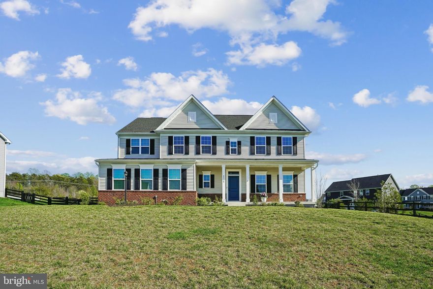This Warrenton colonial is a gem. Sitting on more than half an acre, you get that breathing room everyone craves, with a welcoming front porch to enjoy it from. The side-load garage keeps the curb appeal clean, while the wide spacing between homes means no "right on top of your neighbor" feeling—just room for a wiffleball World Series in that big backyard.
Inside, the open floor plan connects a stunning kitchen, family room, and breakfast area, perfect for gatherings. Upstairs, beyond the four bedrooms, there's a unique loft—a bonus living area. Downstairs, the lower level boasts a cavernous rec room with a full bath—plenty of space to entertain or unwind. Top it off with that Warrenton small-town charm, and this home is both spacious and special.